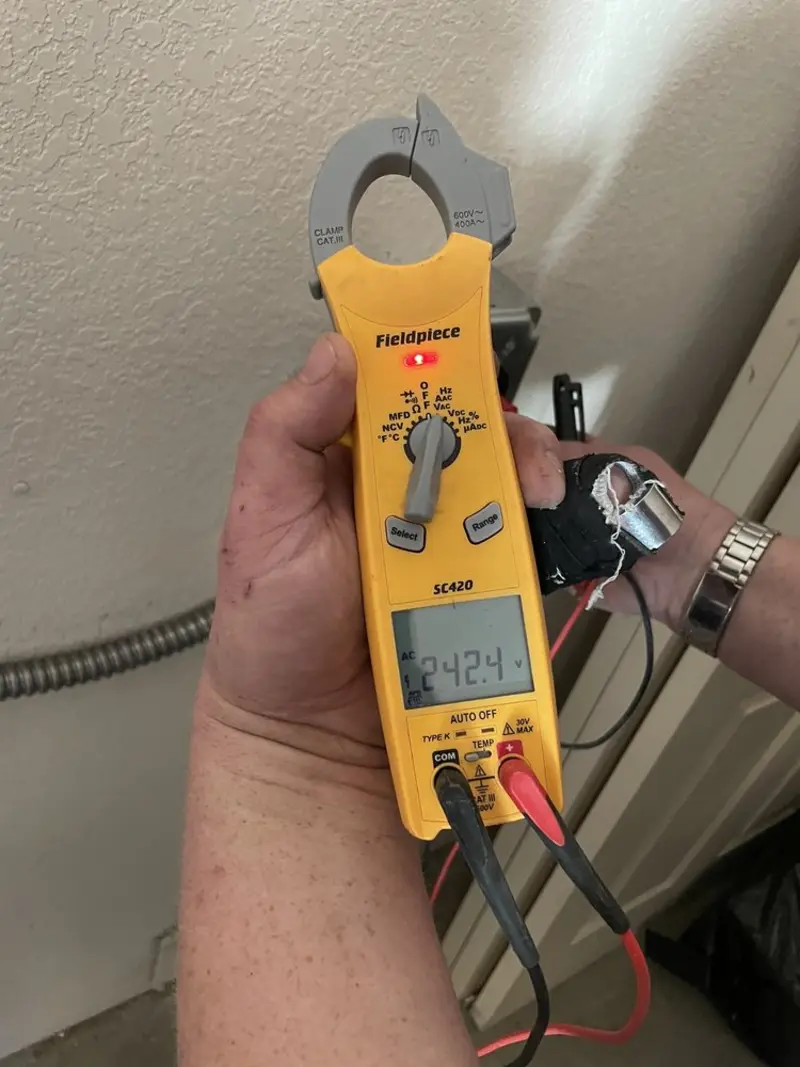 Voltage testing with clamp meter during Ceiling Fan Installation in East Gaffney
